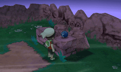 screenshot of the player pokemon trailer receiving the blue orb